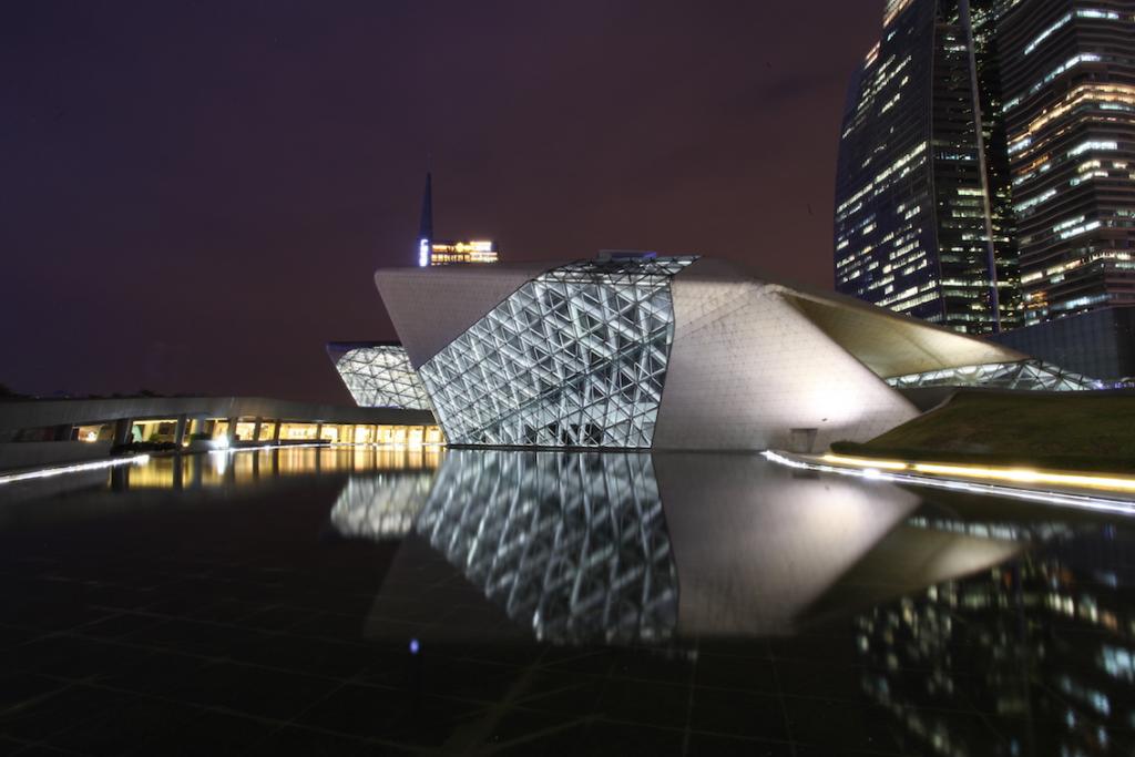 Guangzhou City Guide The Art of Travel Guangzhou Opera House Zaha Hadid exterior reflection