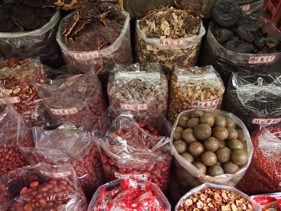 Guangzhou City Guide The Art of Travel Qing Ping Market dried goods mushrooms tree