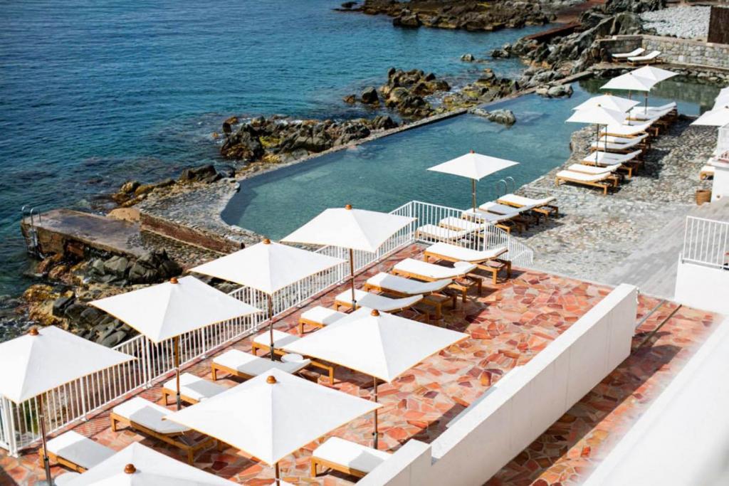 World Traveller Nazanin Rose Matin The Art of Travel Hotel Les Roches Rouges Sain Raphael pool beach